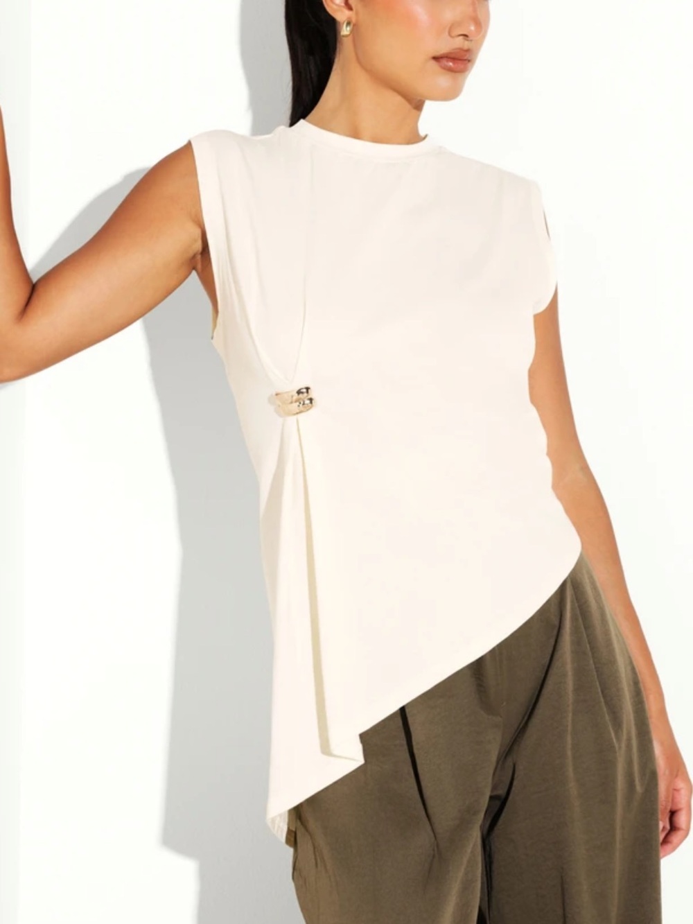 Sleeveless Cream Asymmetric Drape Top with gold Hardware Accent